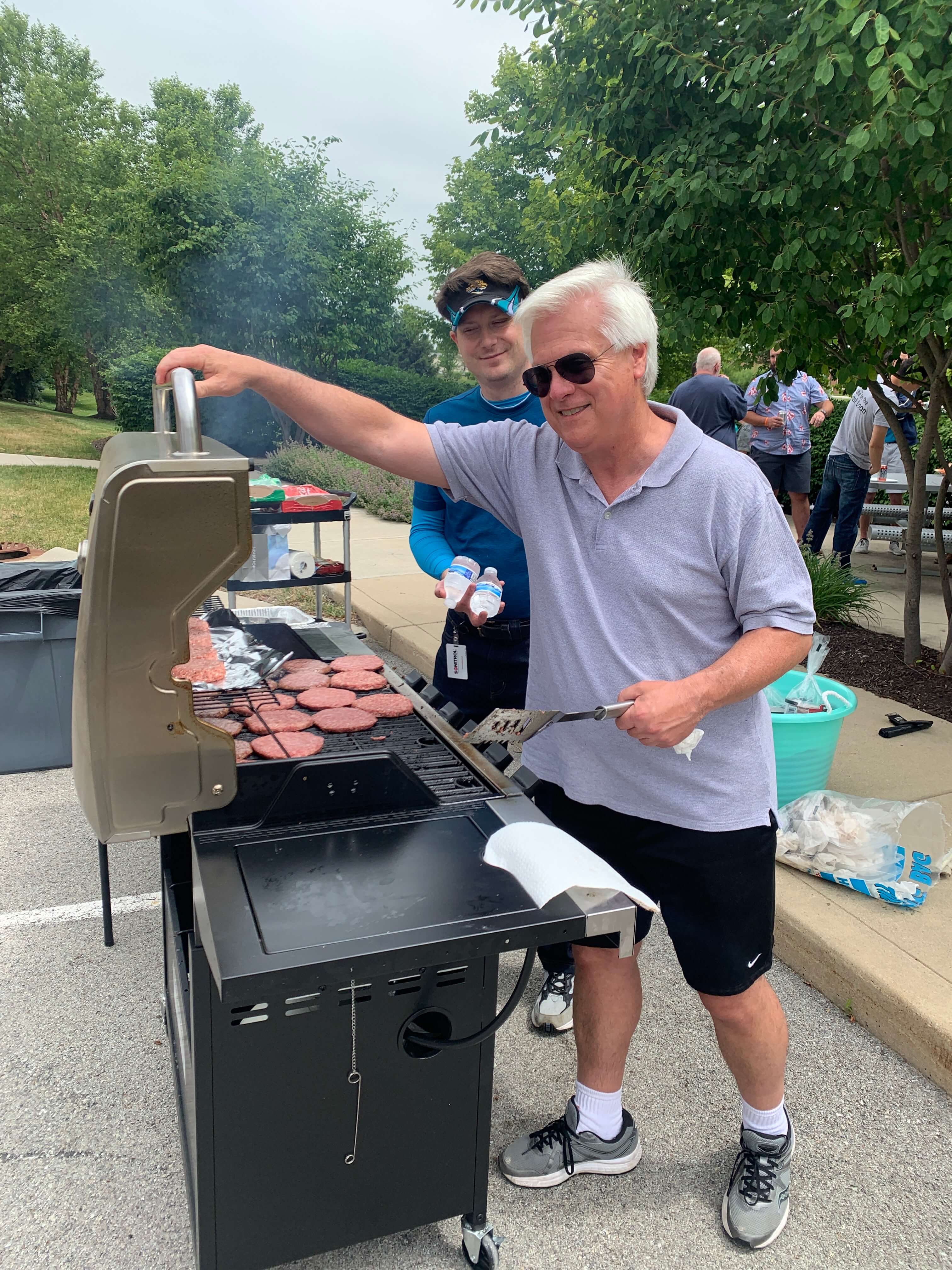 John and Stephen grilling for the comapny cookout.